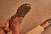 Man wearing olive green flat leather shoes