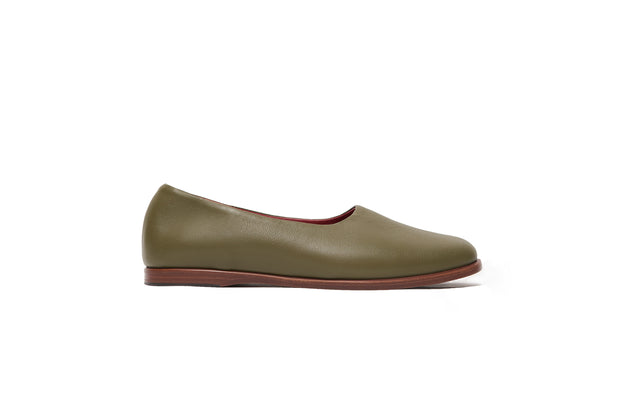 Side view of olive green flat leather shoes