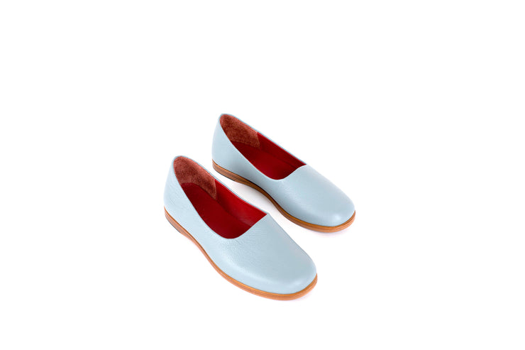 Top view of light blue flat leather shoes
